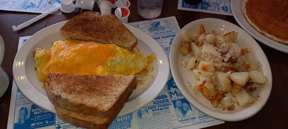 Meat Lovers Omelet with American Fries